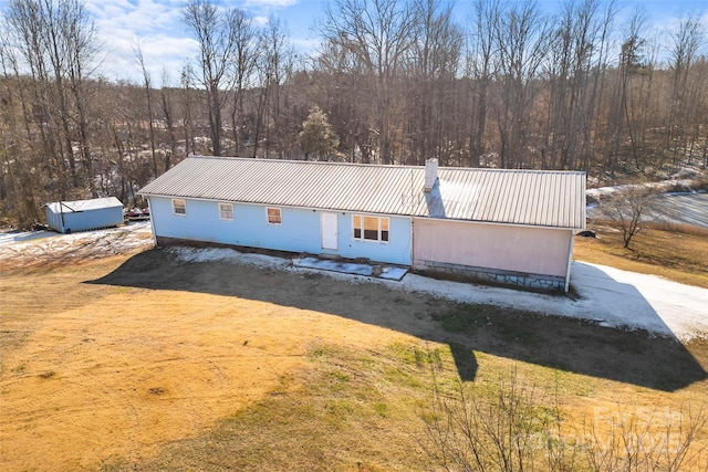 exterior space with a front yard