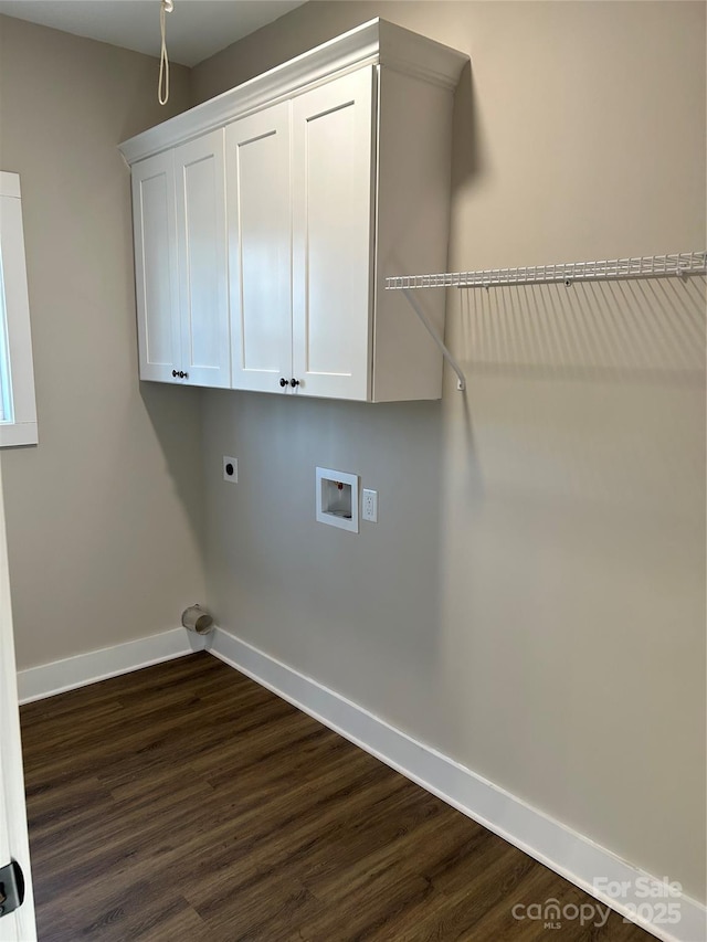 laundry room with cabinets, dark hardwood / wood-style floors, hookup for a washing machine, and electric dryer hookup