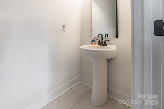 bathroom featuring sink and tile patterned floors