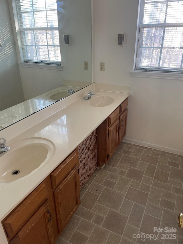bathroom featuring vanity and a wealth of natural light
