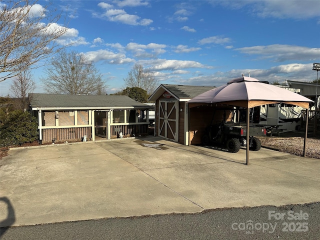 exterior space featuring a carport