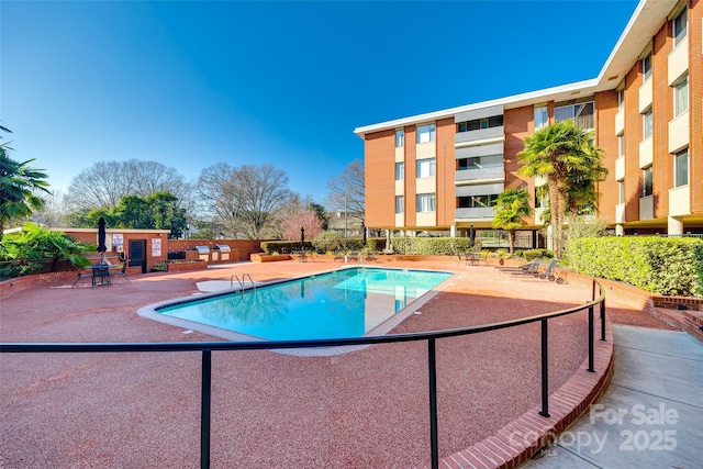 view of pool with a patio area