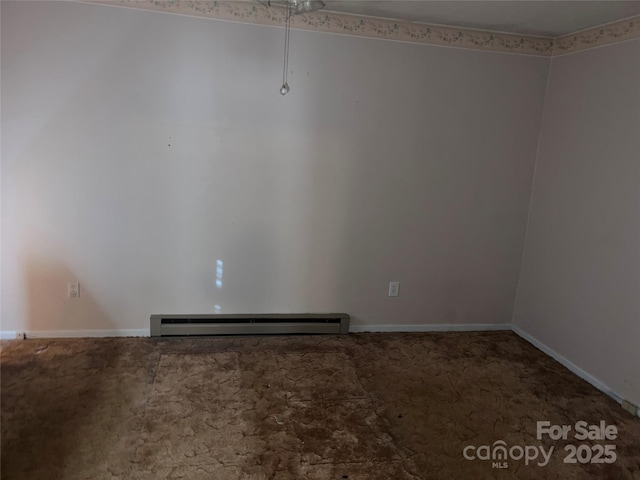 spare room featuring a baseboard radiator