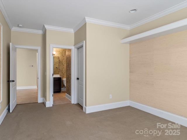 unfurnished bedroom featuring light carpet and ornamental molding