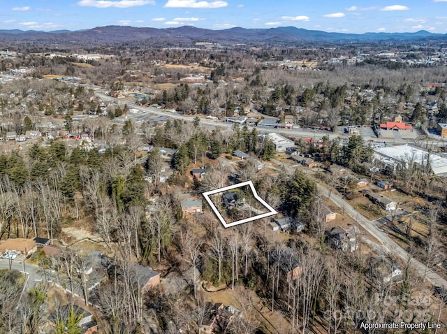 drone / aerial view with a mountain view