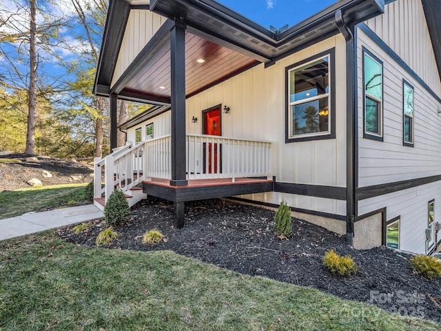 view of side of home featuring a lawn