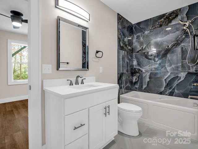 full bathroom featuring vanity, toilet, shower / bath combination, and wood-type flooring