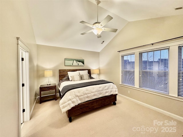 bedroom with light carpet, baseboards, visible vents, and vaulted ceiling