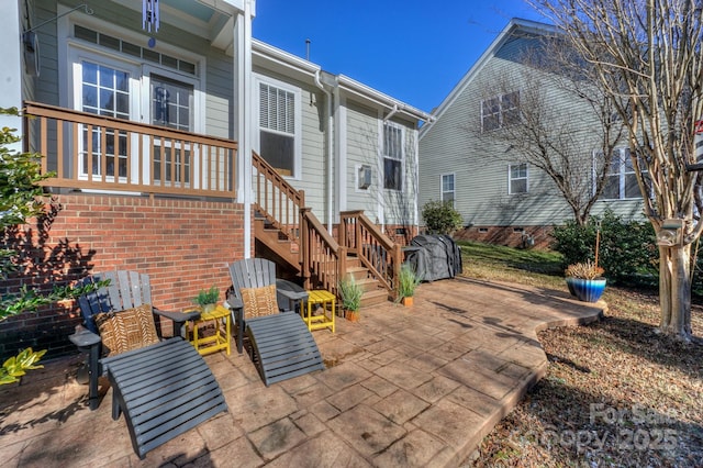 rear view of property featuring a patio