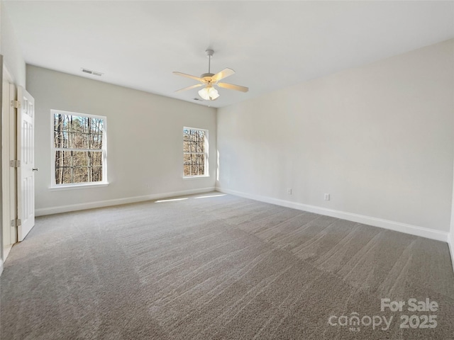 carpeted empty room with ceiling fan