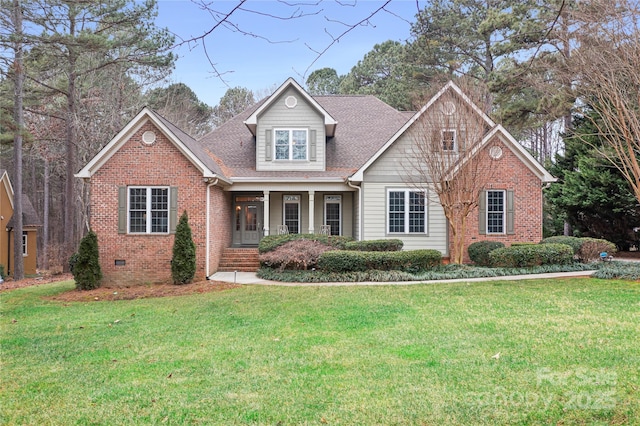 view of front of property with a porch and a front lawn