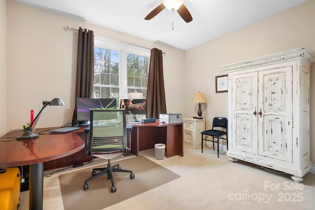 office area with light carpet and ceiling fan