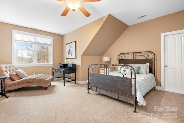 carpeted bedroom featuring ceiling fan and lofted ceiling