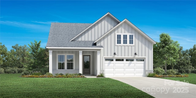 view of front of house with a front yard and a garage