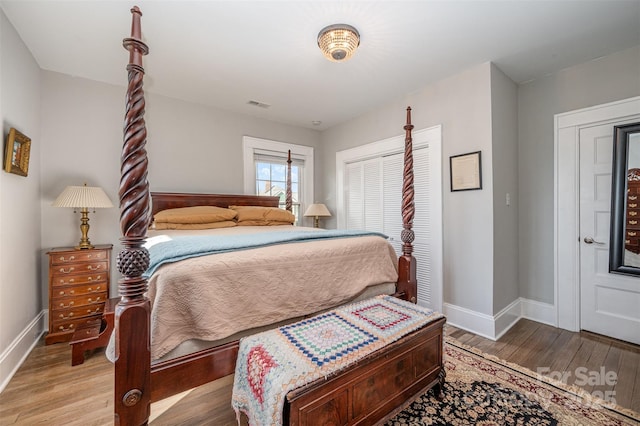 bedroom with hardwood / wood-style floors