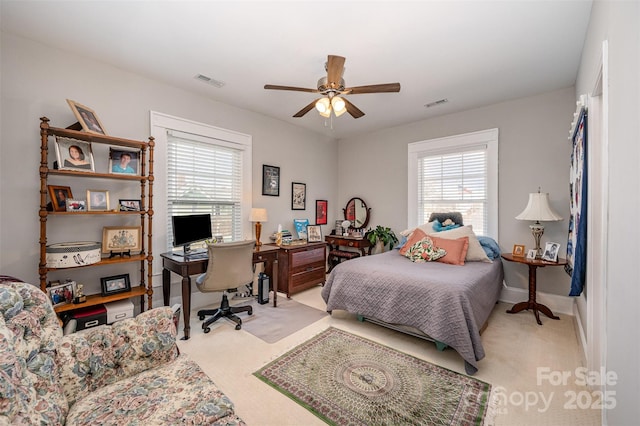 carpeted bedroom featuring ceiling fan