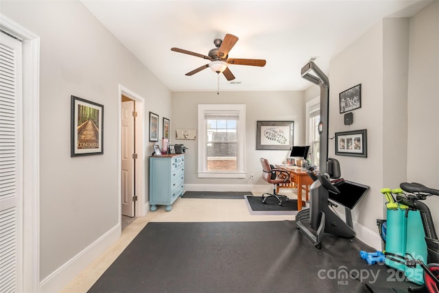 exercise area with ceiling fan