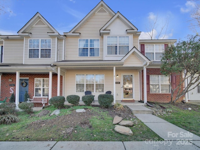 multi unit property featuring covered porch