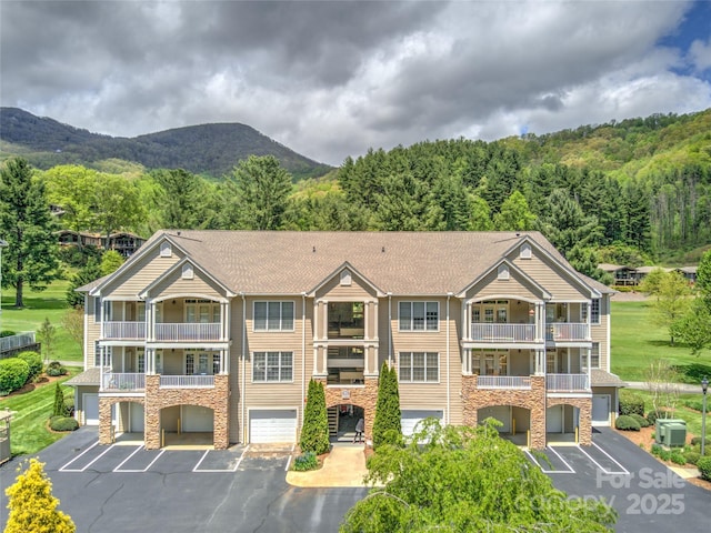 view of building exterior featuring a mountain view