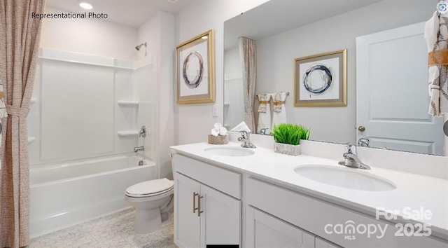 full bathroom featuring vanity, shower / tub combination, and toilet