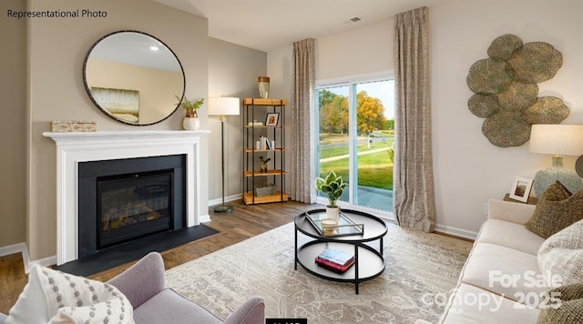 living room with hardwood / wood-style floors