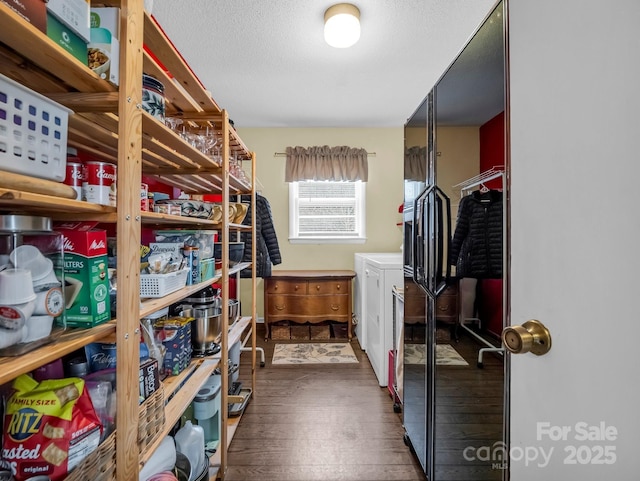 storage room with washer and dryer