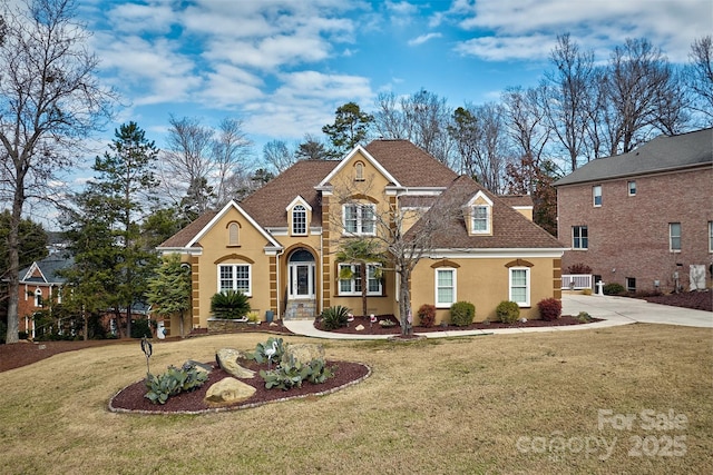 view of front of property with a front lawn