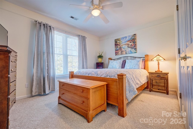 bedroom with light colored carpet and ceiling fan