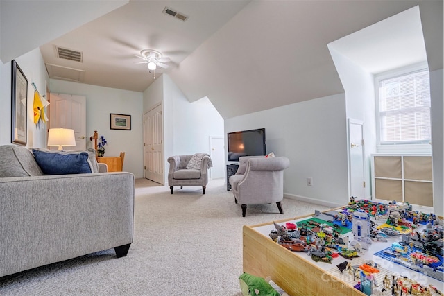 carpeted bedroom featuring lofted ceiling, a closet, and ceiling fan