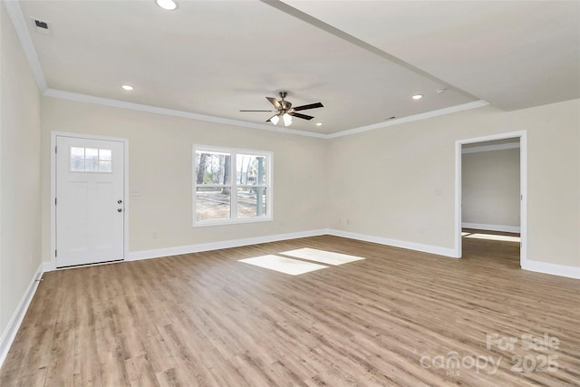 unfurnished living room featuring ceiling fan, light wood-type flooring, and ornamental molding