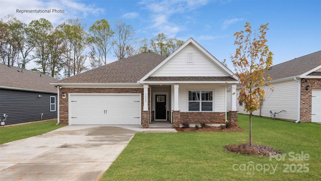 craftsman inspired home with a garage and a front yard