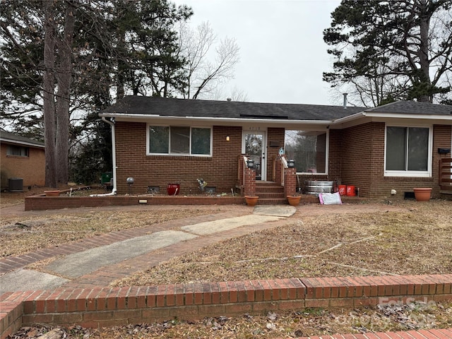 view of front of property featuring cooling unit