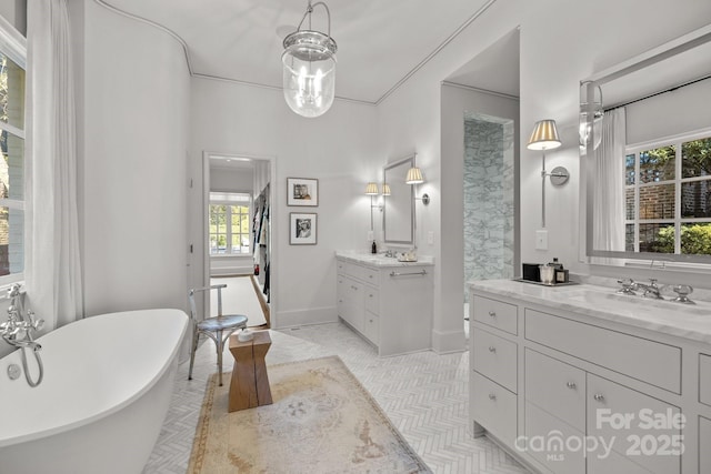 bathroom with a bathtub and vanity