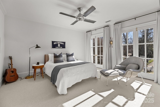 carpeted bedroom featuring ceiling fan, ornamental molding, and access to outside