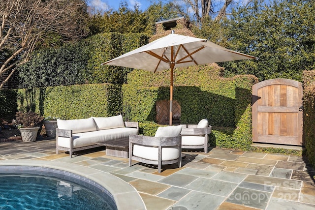 view of patio featuring a pool and an outdoor hangout area