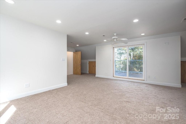 unfurnished room with light carpet and ceiling fan