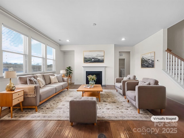 living room with hardwood / wood-style flooring