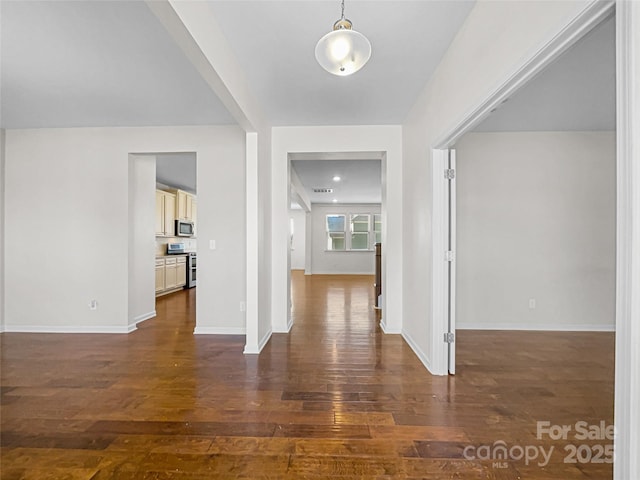 foyer entrance with dark hardwood / wood-style flooring