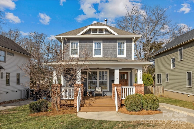 view of front of property featuring covered porch