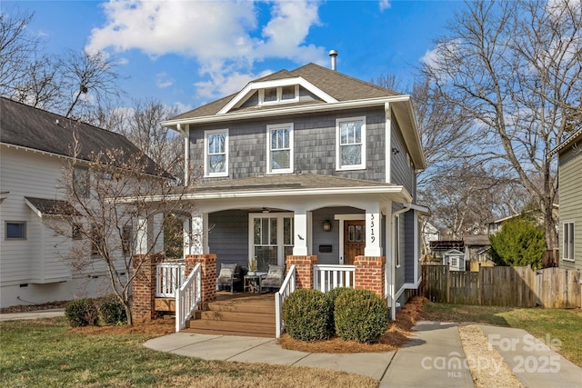 view of front of home featuring covered porch