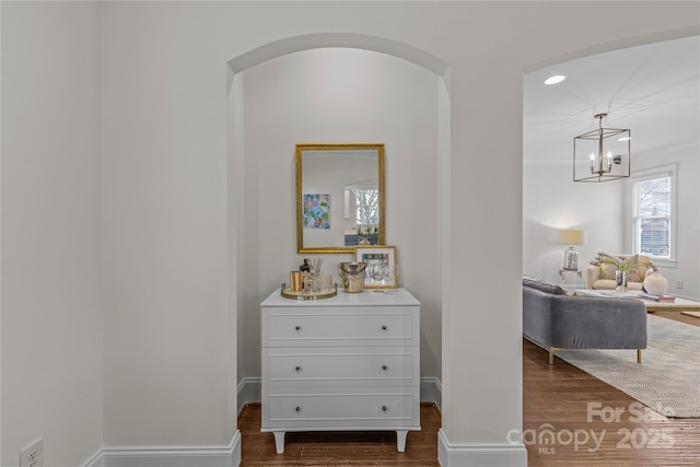 hallway featuring dark hardwood / wood-style floors