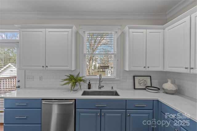 kitchen featuring sink, tasteful backsplash, white cabinets, blue cabinets, and stainless steel dishwasher