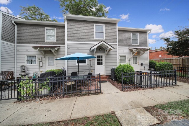 view of front of property with central AC