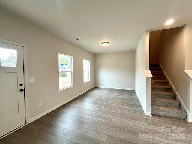 129 Sharon Rd, York, SC 29745 - foyer featuring stairs, baseboards, visible vents, and wood finished floors