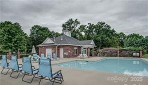 view of pool with a patio