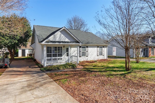 view of front of property with covered porch and a front lawn