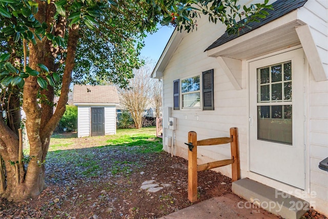 exterior space featuring a storage unit