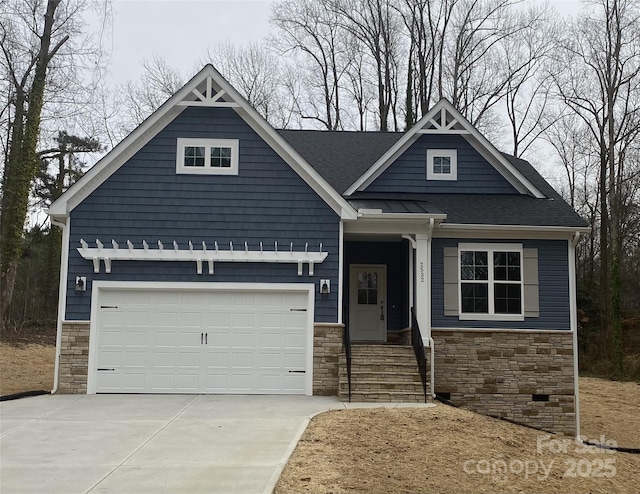 craftsman-style house featuring a garage