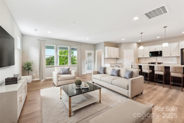 living room featuring light hardwood / wood-style floors