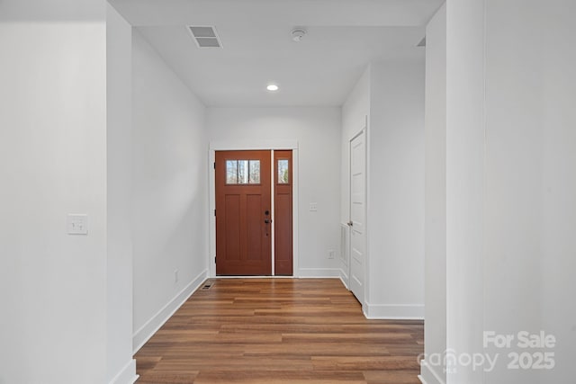 entryway featuring hardwood / wood-style flooring